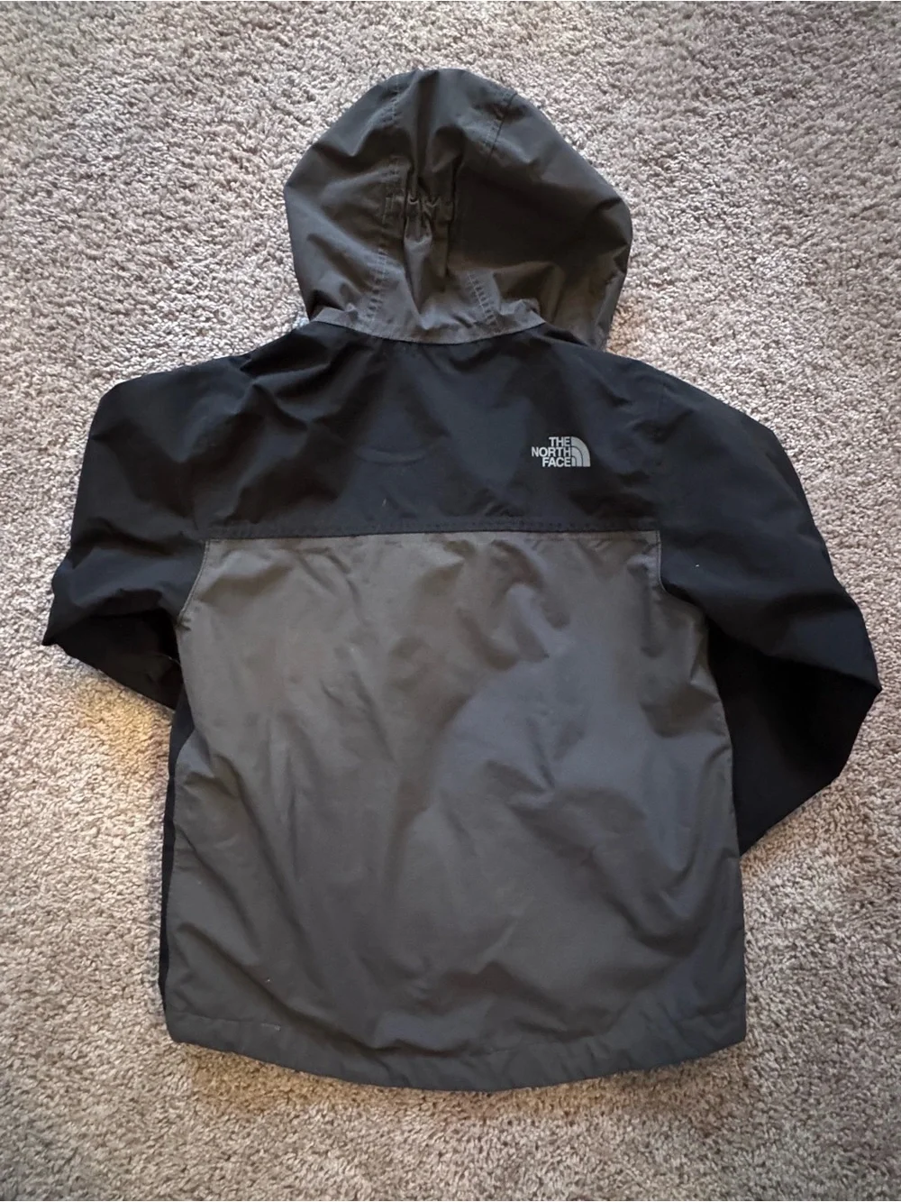 The North Face boys Black and Gray Hooded Raincoat